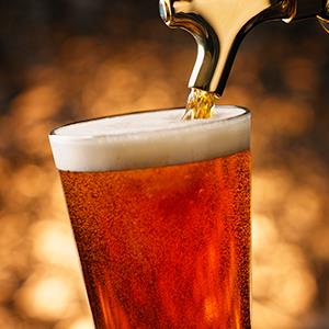 Caption: Beer pouring into a glass
Credit: © Jim Scherer/Getty Images