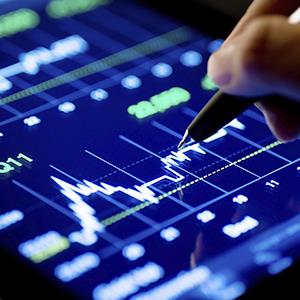 Credit: © woraput/Getty Images
Caption: Market analyze on a digital monitor