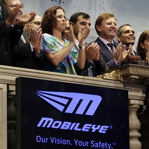 Credit: © Richard Drew/AP
Caption; Opening bell ceremonies marking Mobileye’s IPO on the New York Stock Exchange, Friday, Aug. 1, 2014.
